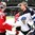 MINSK, BELARUS - MAY 16: Finland's Pekka Rinne #35 and Switzerland's Reto Berra #20 shake hands after preliminary round action at the 2014 IIHF Ice Hockey World Championship. (Photo by Andre Ringuette/HHOF-IIHF Images)

